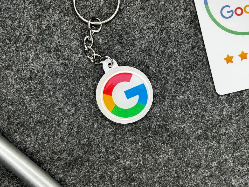 An NFC keychain fob with a tap target on the front